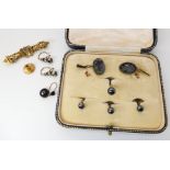 A pair of hematite centurion cufflinks (one af) a set of four boxed 9ct hematite shirt studs and