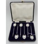 A cased set of six silver coffee bean spoons, Sheffield 1933 Condition Report: Available upon