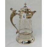 An etched glass and silver plate mounted ale jug with Griffin handle, 31cm high Condition Report: