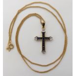 A 9ct gold sapphire and diamond cross dimensions 2.8cm x 1.7cm, with a 9ct gold chain length 46cm,