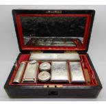 A Victorian mahogany and brass mounted gent's travel case, the hinged cover with brass plaque