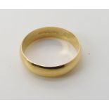 An 18ct gold wedding ring size P1/2, weight 3.7gms Condition Report: Available upon request