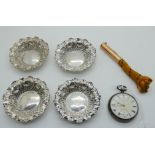 A lot comprising a set of four silver bon bon dishes, (8.5cm diameter), a silver cased pocket
