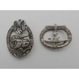 A lot comprising a replica German Tank Assault badge and a Kriegsmarine badge Condition Report: