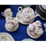 A Royal Albert Lavender Rose teaset comprising teapot, six cups, saucers, plates, milk jug and sugar