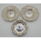 A lot comprising a pair of silver bon bon dishes, London 1895,15cm diameter and a single bon bon