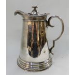A silver plated ale jug, 30cm high Condition Report: Available upon request