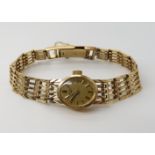 A ladies 9ct gold Rotary watch and strap, weight including mechanism 17.9gms Condition Report: