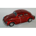 A Bandai Kings size battery operated Volkswagen/Sedan in original box, 35cm wide Condition Report: