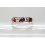 An 18ct white gold ruby and diamond ring set with estimated approx 0.18cts of brilliant cut diamonds