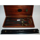 A vintage Naval Station Pointer by H. Hughes & Sons, No. 802 in original fitted case and a rolling
