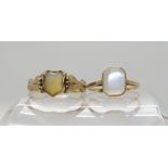 A yellow metal moonstone ring size K, together with a yellow metal agate set signet ring size P1/