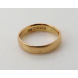 An 18ct gold wedding band size M1/2, weight 4.4gms Condition Report: Available upon request