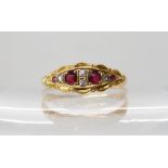 An 18ct gold ruby and diamond ring size T1/2, weight 3.1gms Condition Report: Available upon