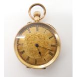 A 14k gold open face fob watch diameter 3.8cm, weight including mechanism and metal dust cover 44.