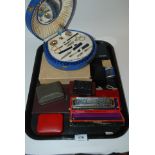 A tray lot including table lighters, Hohner Chromonica in original box etc Condition Report: