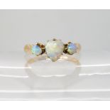 An 18ct gold heart shaped opal ring, size K1/2, weight 2.3gms Condition Report: Abrasions to the top