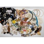 A collection of vintage costume jewellery to include xmas items Condition Report: Not available
