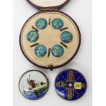 A boxed set of silver and enamel Arts & Crafts buttons, an 1887 Victorian Jubilee coin enamelled