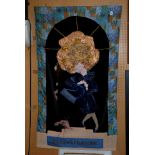 An embroidered wall hanging of Margaret Thatcher "Where there is Discord" by Edith Clarke