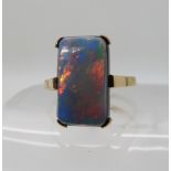 A 9ct gold opal doublet ring, dimension of the opal 17mm x 9mm, finger size S1/2, weight 4gms