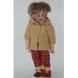 A Simon and Halbig boy doll with painted features and impressed factory marks, (def) 30cm high,