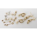 Two pairs of 14k gold pearl earrings, weight 5.2gms and a further three pairs in 9ct and yellow