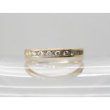 *WITHDRAWN* An 18ct gold diamond half eternity ring, set with estimated approx 0.20cts of baguette