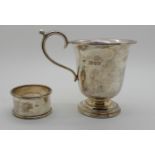 A lot comprising a silver Christening mug, London marks and napkin ring, 114grms Condition Report: