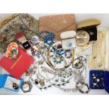 A Butler & Wilson mirror compact, Two evening bags, and vintage costume jewellery Condition