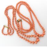 Two strings of coral beads largest bead 9mm, length 60cm, second necklace largest bead 8.2mm, length