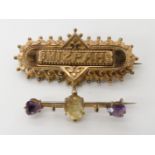 A yellow metal Mizpah brooch with locket back length 5cm and a yellow metal citrine and amethyst