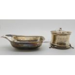 A lot comprising a silver inkwell and a silver pap boat (rubbed marks) Condition Report: Available