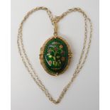 A 9ct gold guilloche enamelled locket and chain, dimensions of locket 4.2cm x 2.4cm, weight 11gms