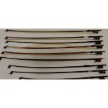 A lot of nine violin bows, varying sizes 58cm, 64cm, 65cm, 73cm, 71cm, 72.5cm, 73cm (af) Condition