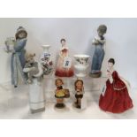 Two Hummel figures, two Lladro figures, a Nao figure, a Doulton figure Flower of Love, another