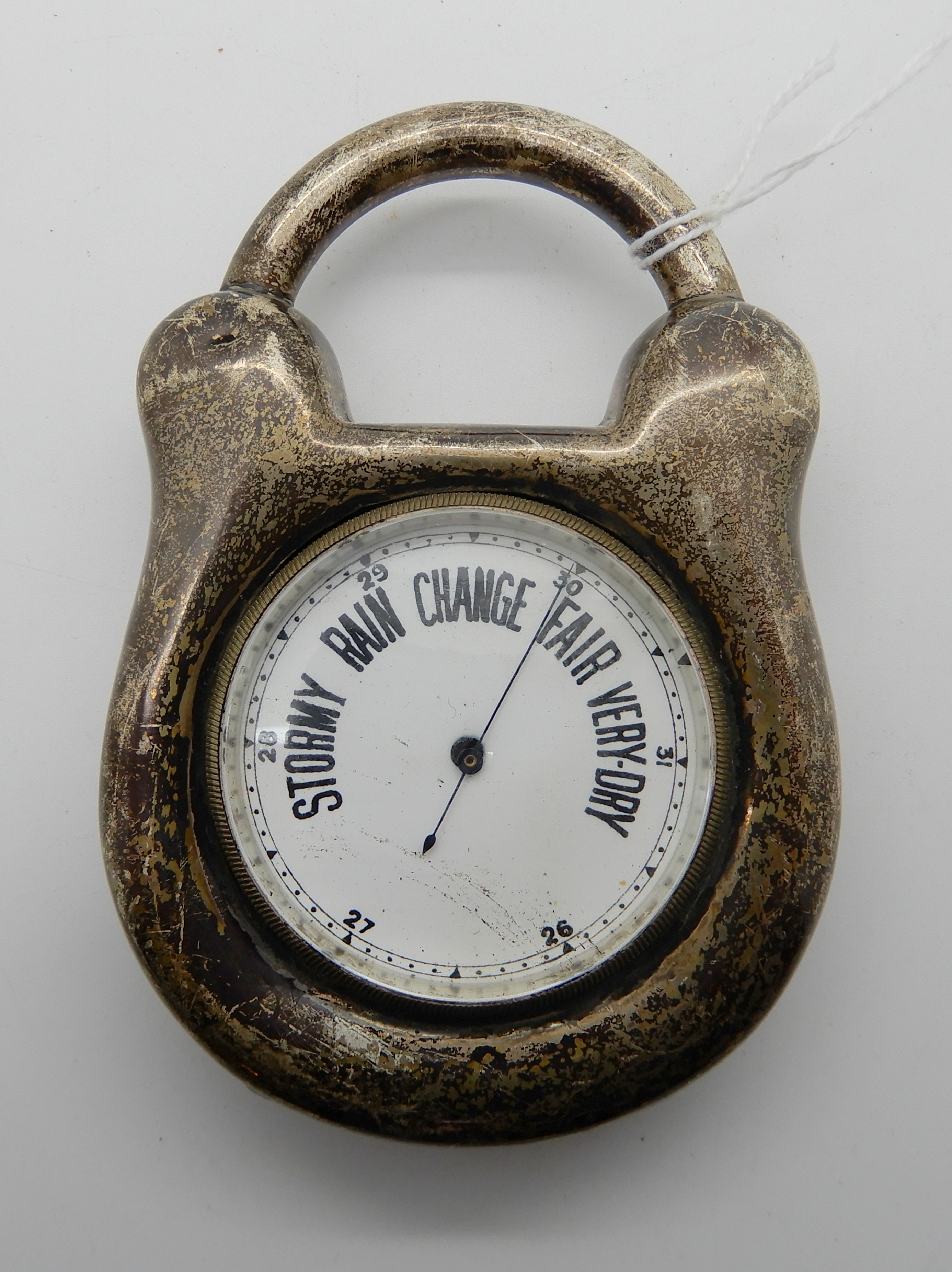 A silver cased barometer modelled as a padlock (rubbed marks) Condition Report: