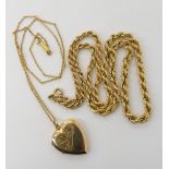 A 9ct gold tapered rope chain length 46cm, weight 7.3gms and a 9ct back and front locket with rolled