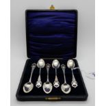 A cased set of six silver coffee spoons with Arts and Crafts terminals, Glasgow 1904 Condition