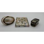A lot comprising a mother of pearl card case and two snuff boxes Condition Report: Available upon