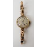 A ladies 9ct gold vintage Rolex watch and strap, weight including mechanism 22.9gms Condition