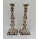 A pair of Rococo style silver plated candlesticks, 31cm high Condition Report: Available upon