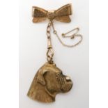 A 9ct gold boxer dog pendant/brooch by Edinburgh goldsmith Alan Hodkinson, length of brooch 9cm,