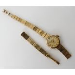 A 9ct gold ladies Smiths watch with (af) integral strap weight including mechanism 16.7gms Condition