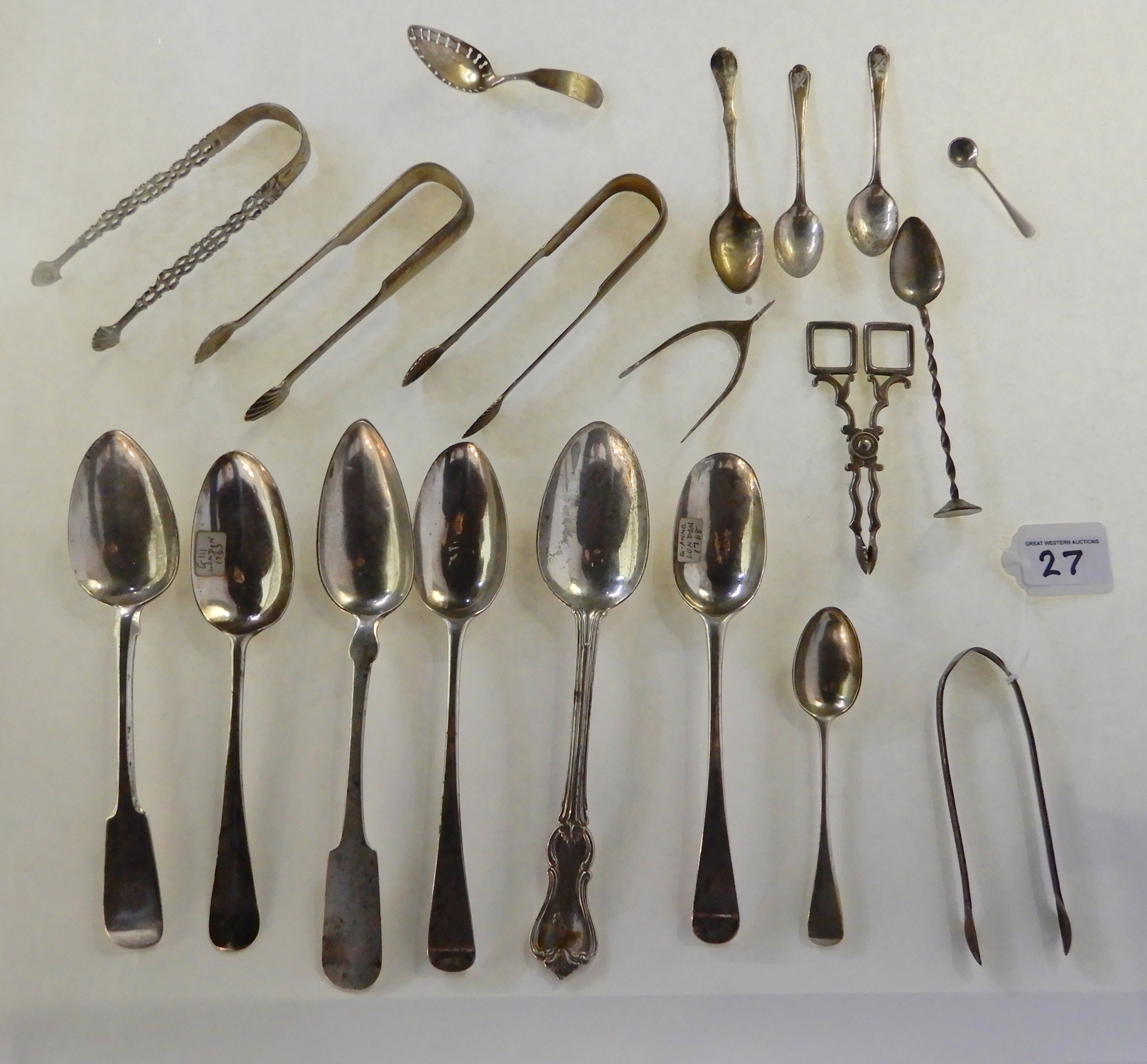 A lot comprising six assorted silver tablespoons, a silver caddy spoon, white metal and silver