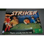 A boxed Parker Striker game and a collection of other board games Condition Report: Available upon
