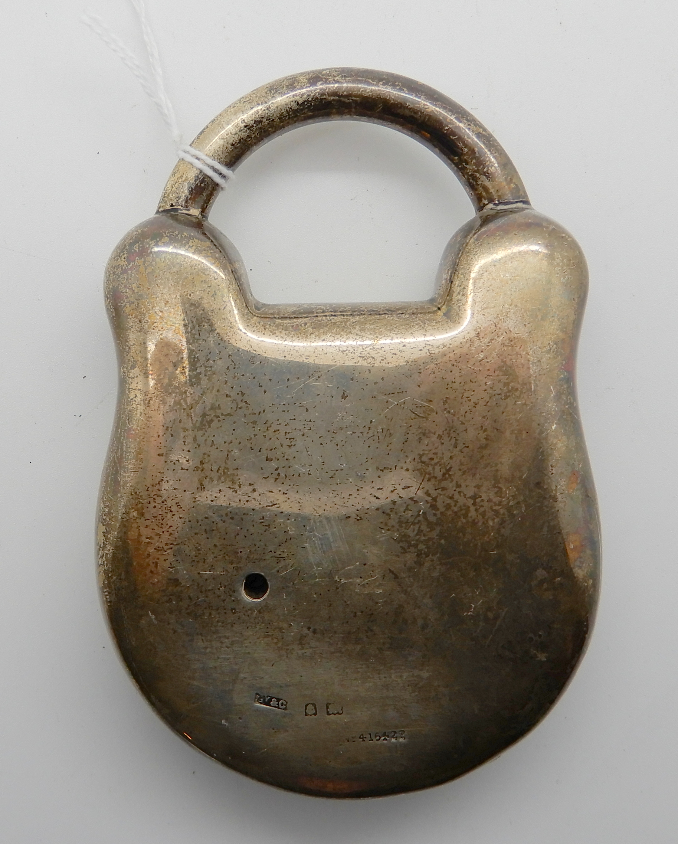 A silver cased barometer modelled as a padlock (rubbed marks) Condition Report: - Image 2 of 2