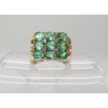 A 9ct gold green gem and diamond cluster ring, size O, weight 5.1gms Condition Report: Available