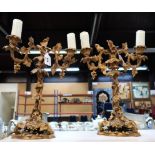 A pair of gilt metal vine and grape candelabras, 34cm high, converted to electricity Condition