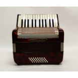 A Worldmaster 26key/32 bass accordion with case Condition Report: Available upon request